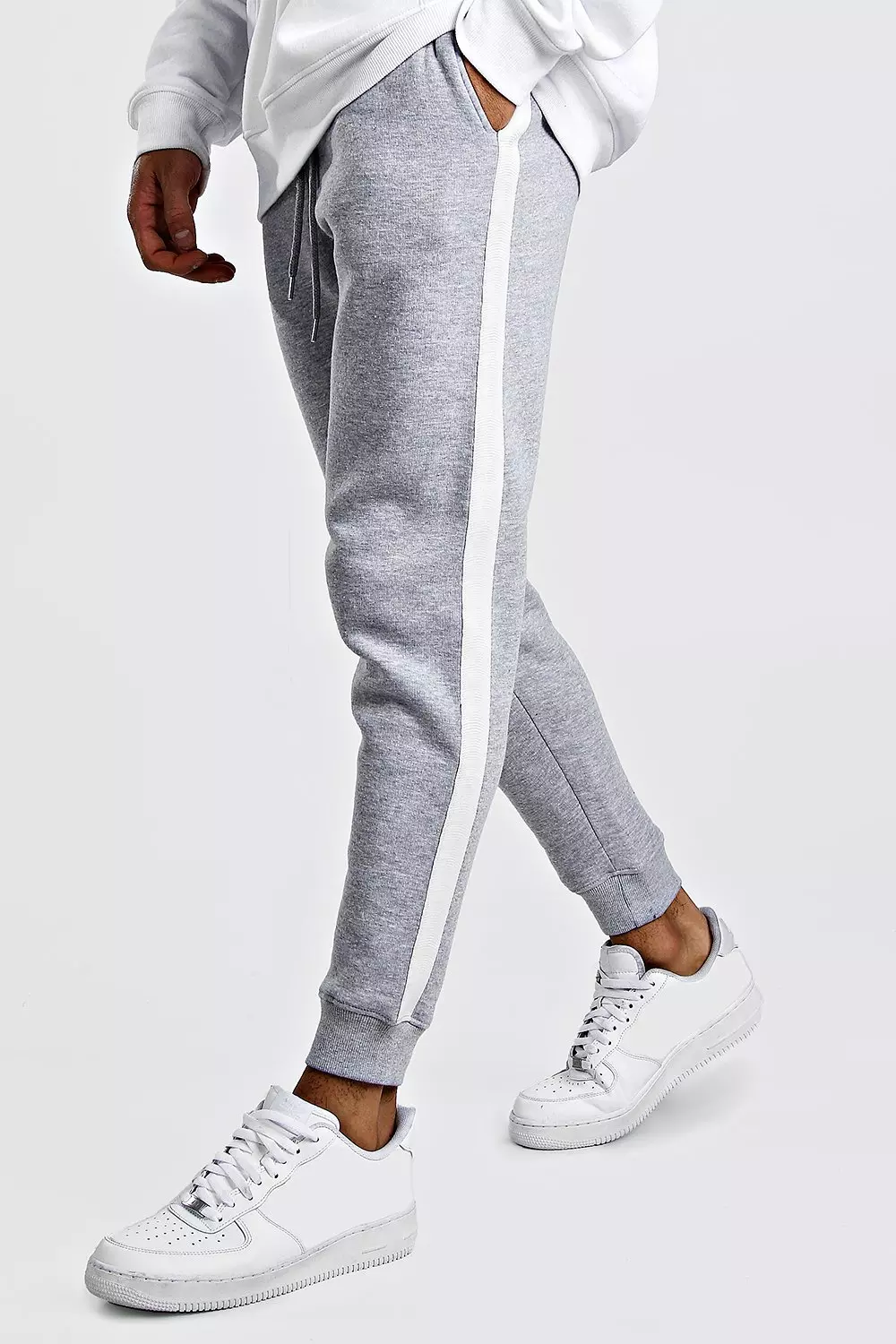 Jogging skinny avec bande lat rale blanche boohooMAN FR